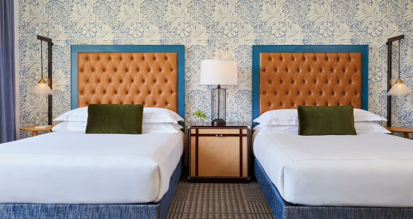 kimpton-denver-colorado-hotel-monaco-guestroom-double-queen-sleeping-room-headboards-beds-8340987c